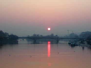 východ slunce z Čechova mostu