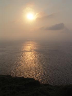 slunce nad mořem z Dunnet Head